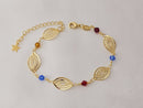 Pulseira com geométrico oval vazado e pedras sintéticas coloridas, banhada a ouro, 22cm com extensor, estrela na ponta.